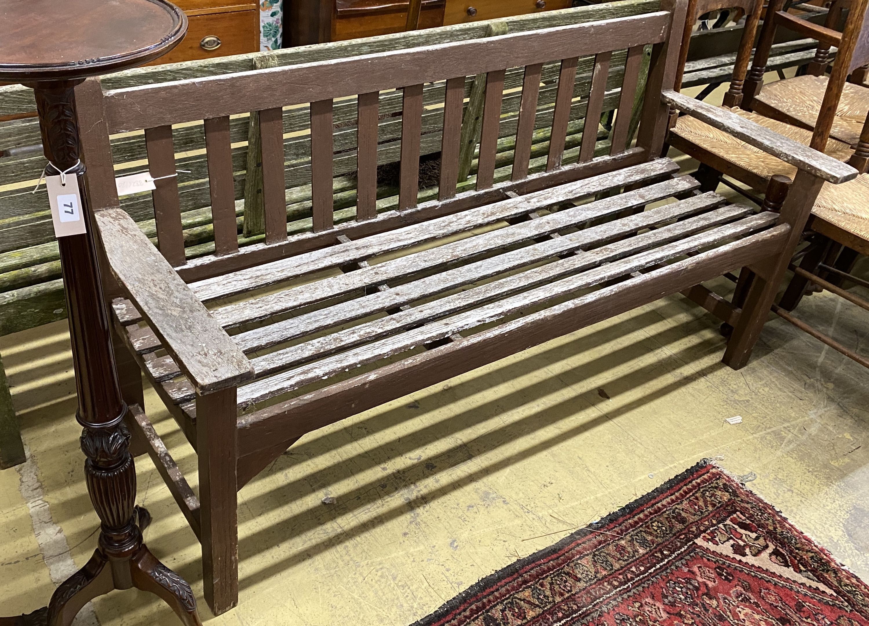 A part painted weathered teak garden bench, length 158cm, depth 56cm, height 84cm